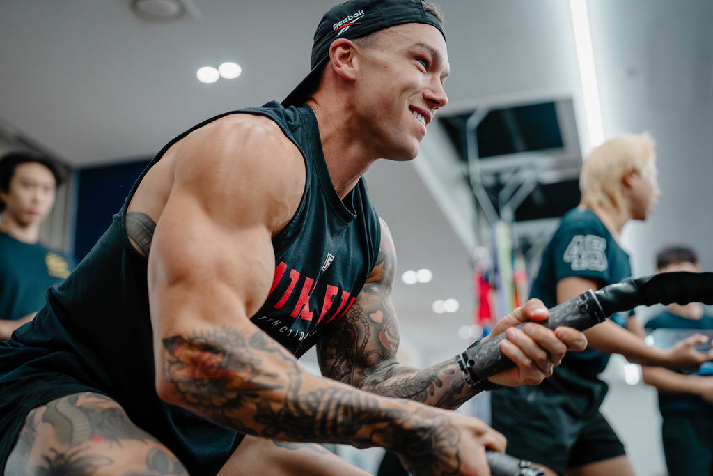 Man working out with a group in an F45 studio